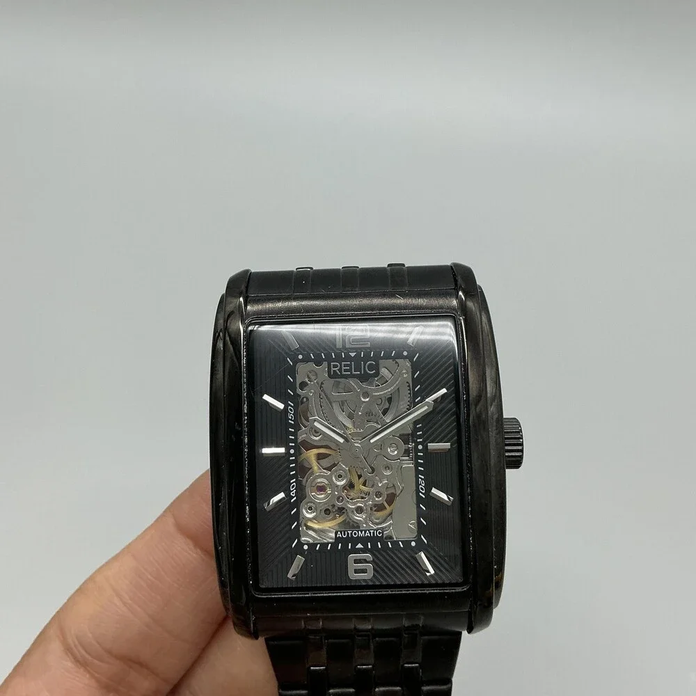Relic by Fossil see photos
